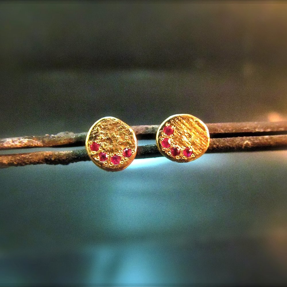 Gold earrings for women.